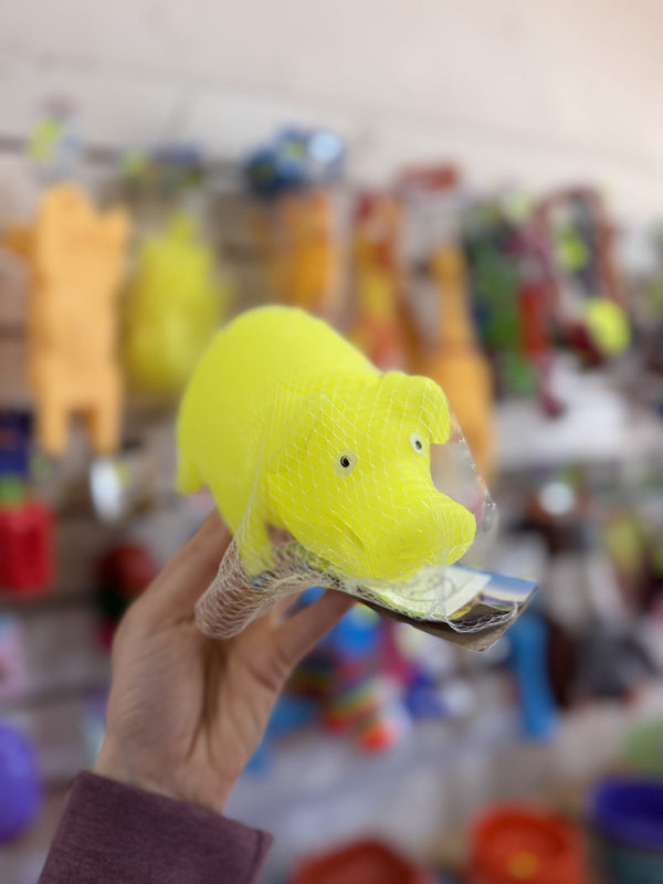 Chancho de goma amarillo flúor