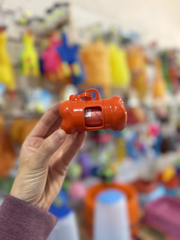 Dispensador de bolsitas higiénicas hueso naranja