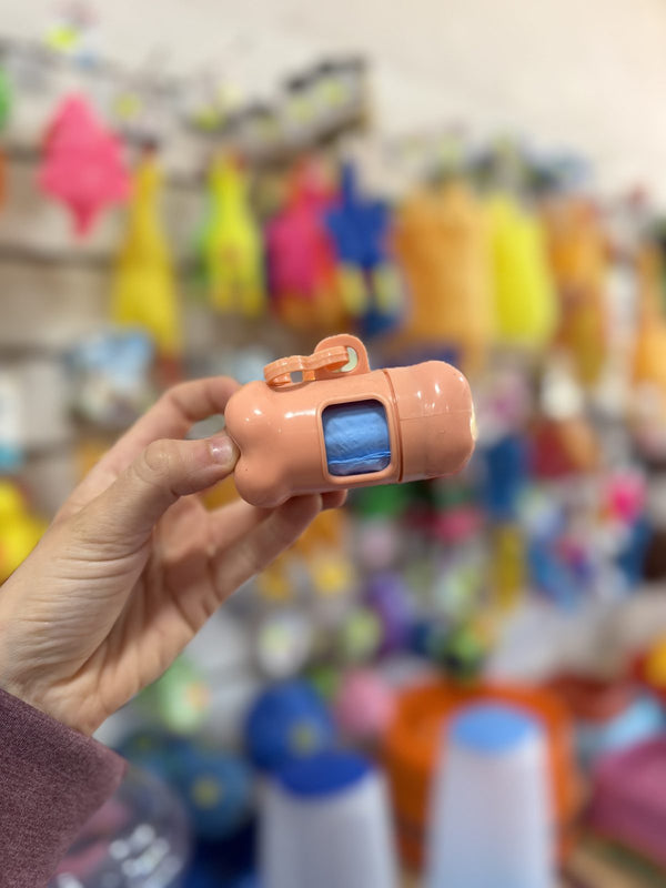 Dispensador de bolsitas higiénicas rosa salmón
